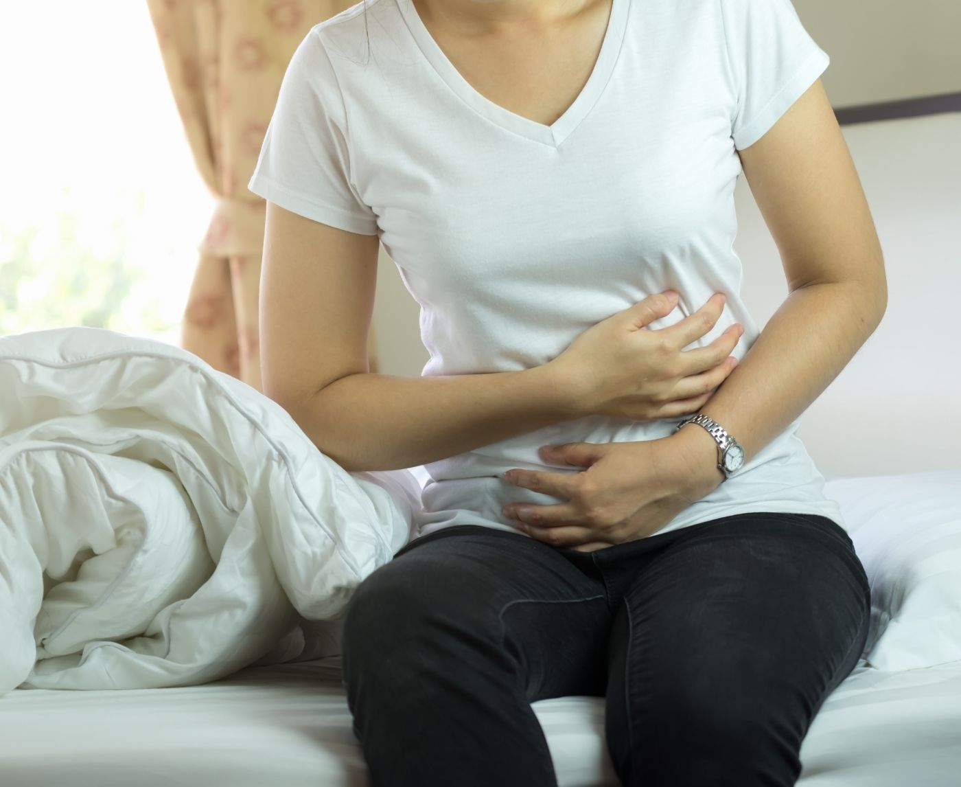 Why Your Belly Pain Might Actually Be an STD